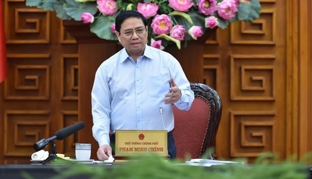Le Premier ministre vietnamien, Pham Minh Chinh, préside la réunion du 28 juillet. Photo : VNA.