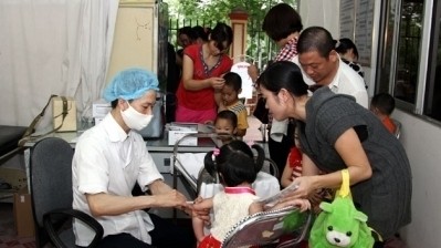 Vaccination contre la rougeole au Vietnam. Photo: VNA.