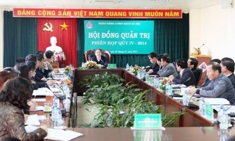 Le gouverneur de la Banque d’État du Vietnam, Nguyên Van Binh, préside la réunion annuelle du Conseil d’administration de la Banque des politiques sociales du Vietnam. Photo: VGP.